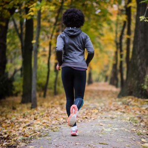 young-woman-jogging-through-the-fall-park-rear-shot-royalty-free-image-1632499281-300x300